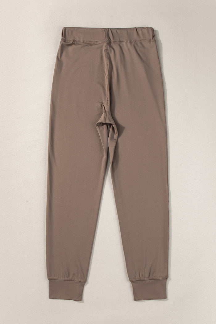 Pantalon de jogging marron foncé avec poches et cordon de serrage à la taille