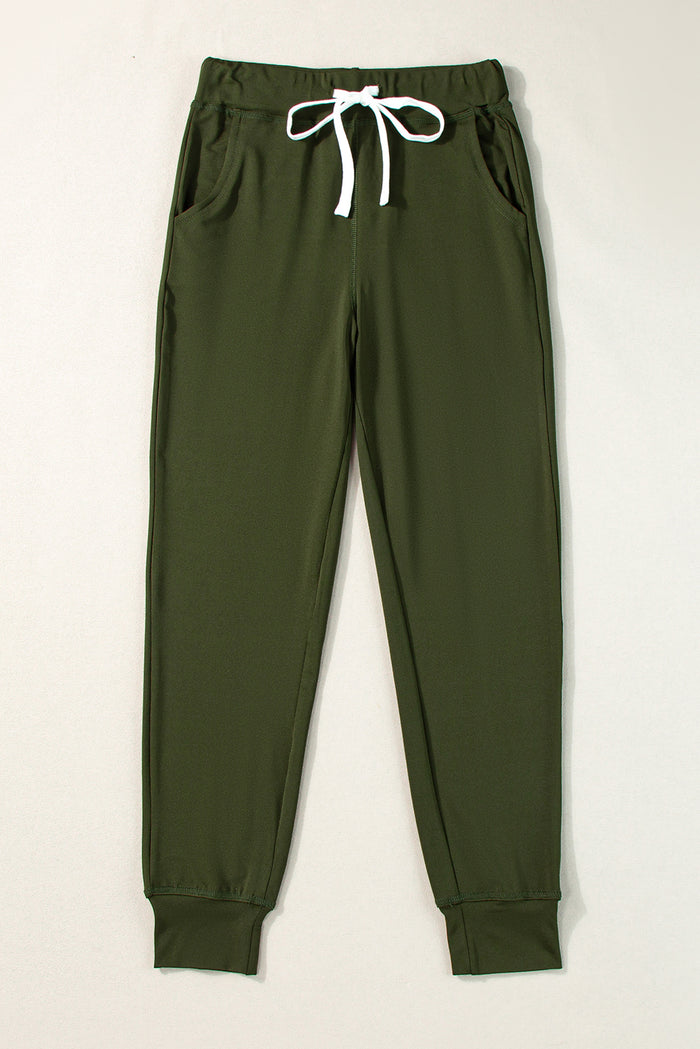 Pantalon de jogging vert mousse avec poches à la taille et cordon de serrage