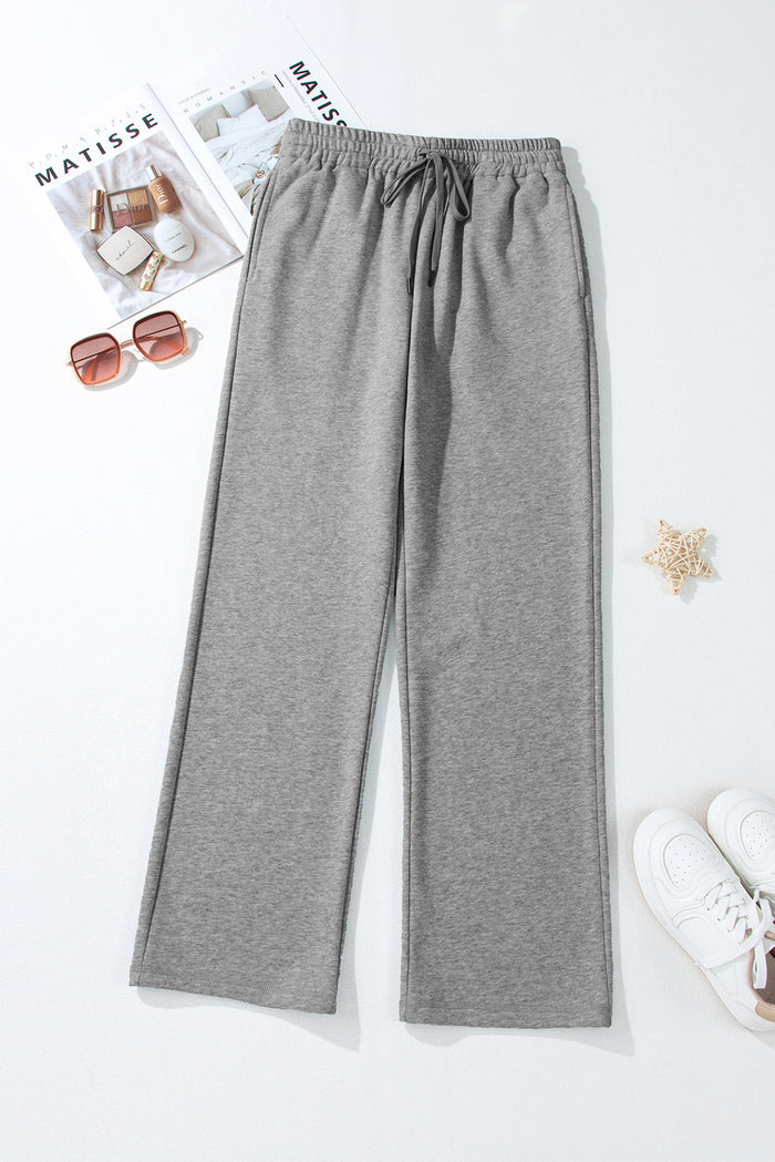 Pantalon décontracté à taille avec cordon de serrage doublé en polaire de couleur unie gris clair