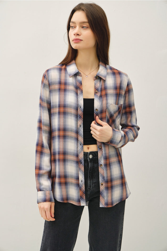 orange and blue plaid button down top