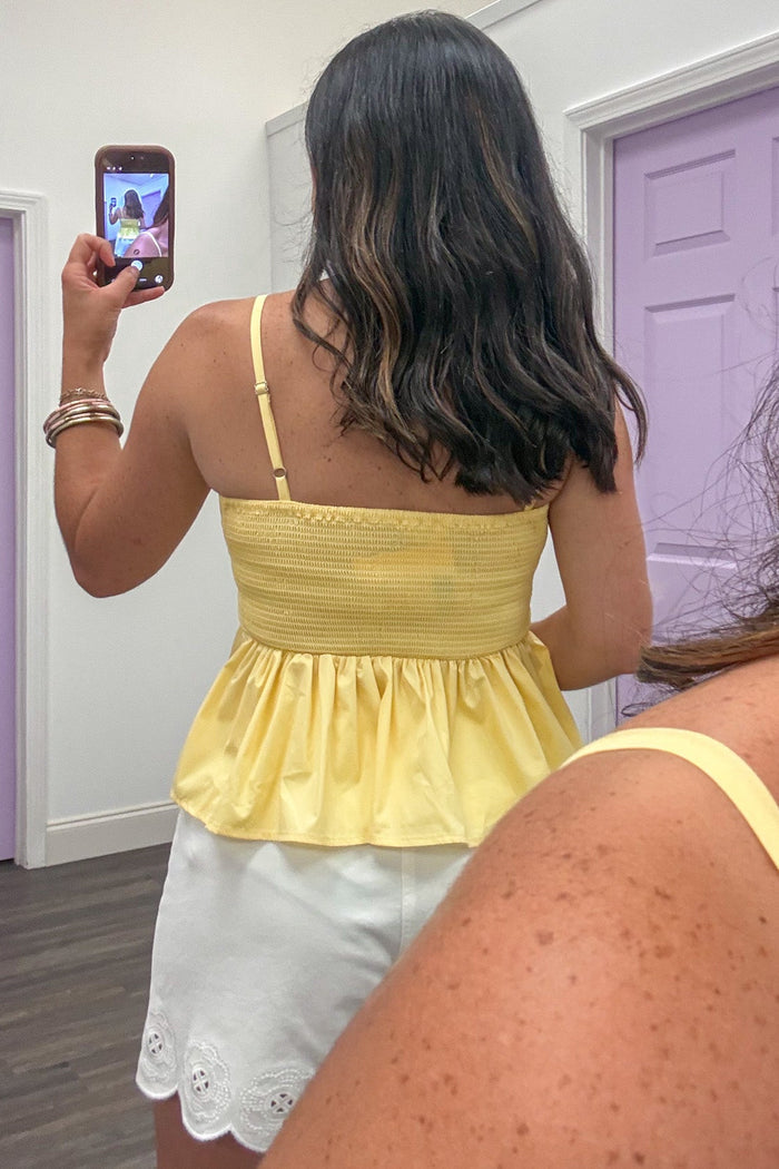 golden yellow smocked back sleeveless spaghetti strap semi-cropped peplum top