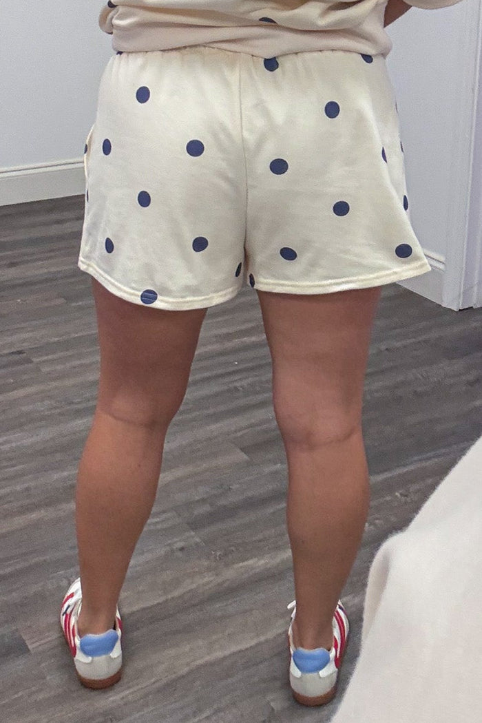 ivory with navy polka dot print terry knit shorts back view