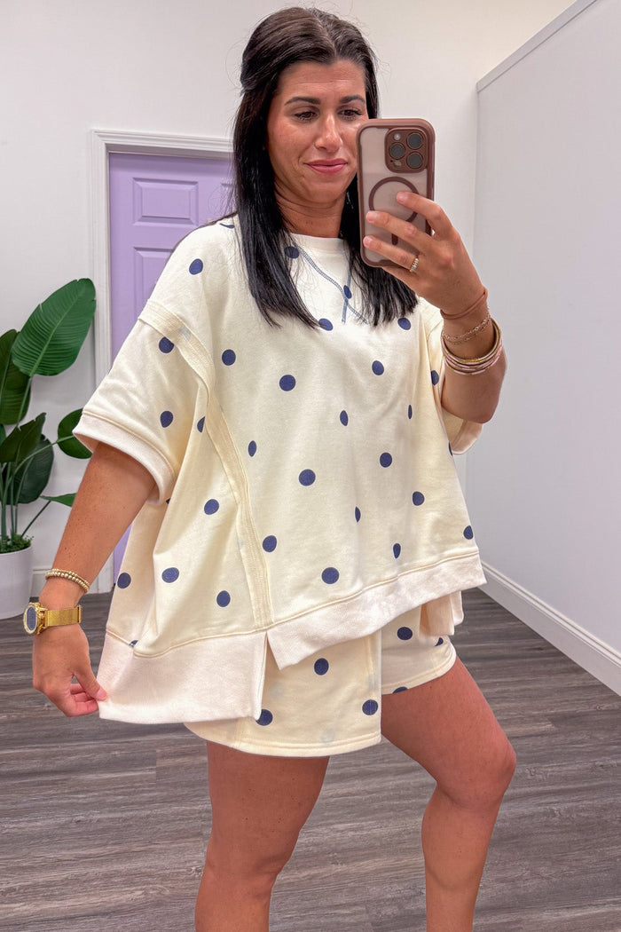 ivory with navy polka dot print short sleeve terry knit dolman top