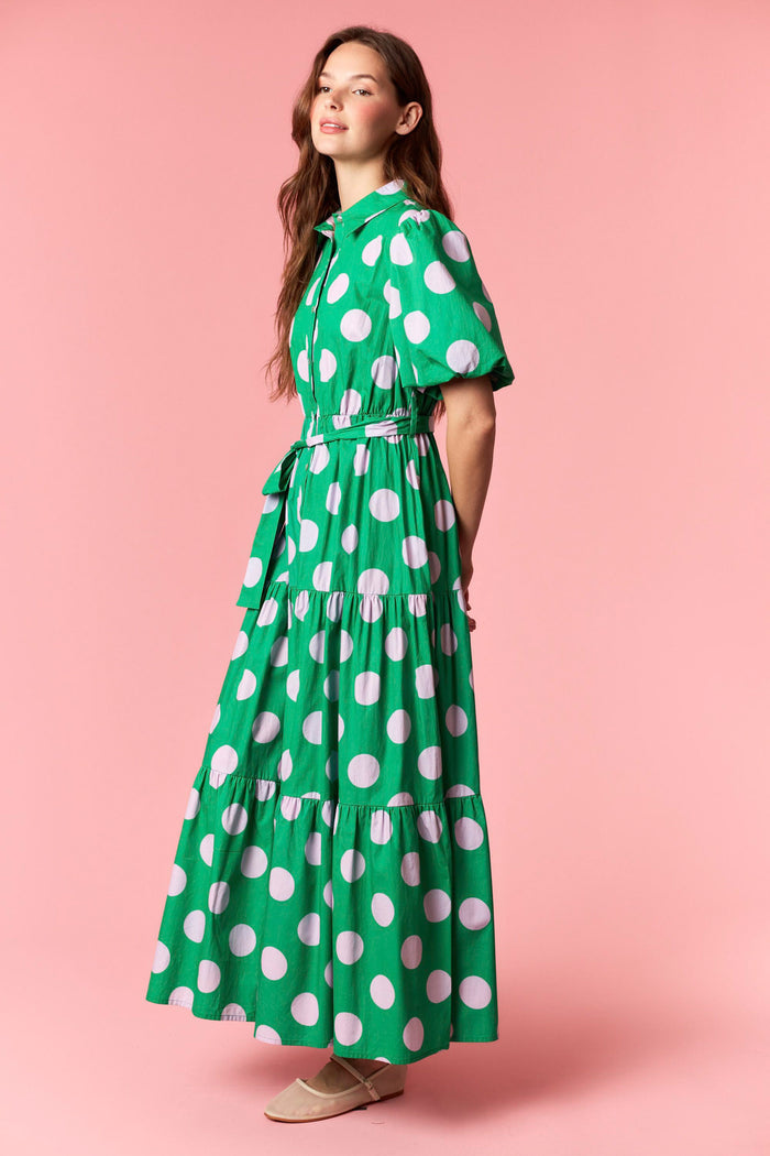 Women's green and pink polka dot midi dress, side view
