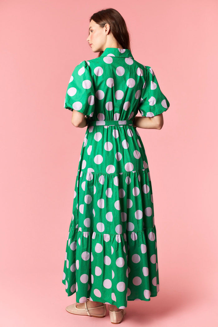 back view of Women's green and pink polka dot midi dress with belt