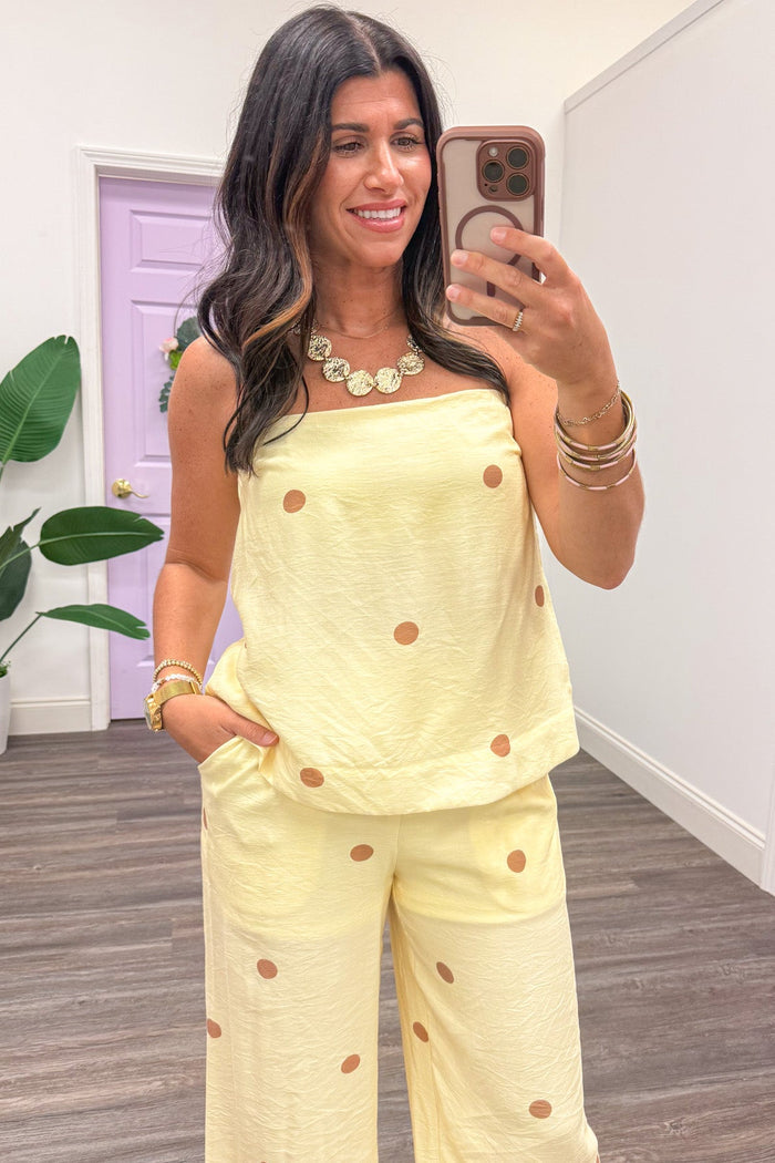 pale yellow with light brown polka dot print strapless lightweight top