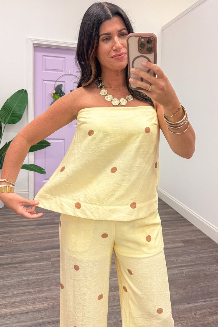 pale yellow with light brown polka dot print strapless relaxed silhouette top