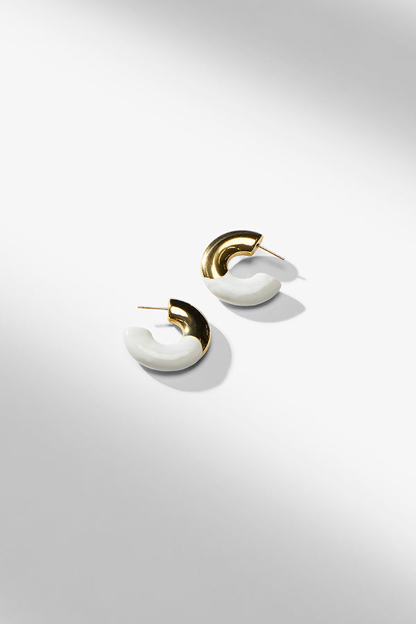 packshot image of the quinn earring | Exclude | Grid