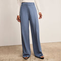 front image of a woman wearing Rina Sculptural Pant - OrigamiTech :: Dusty Blue | Lead