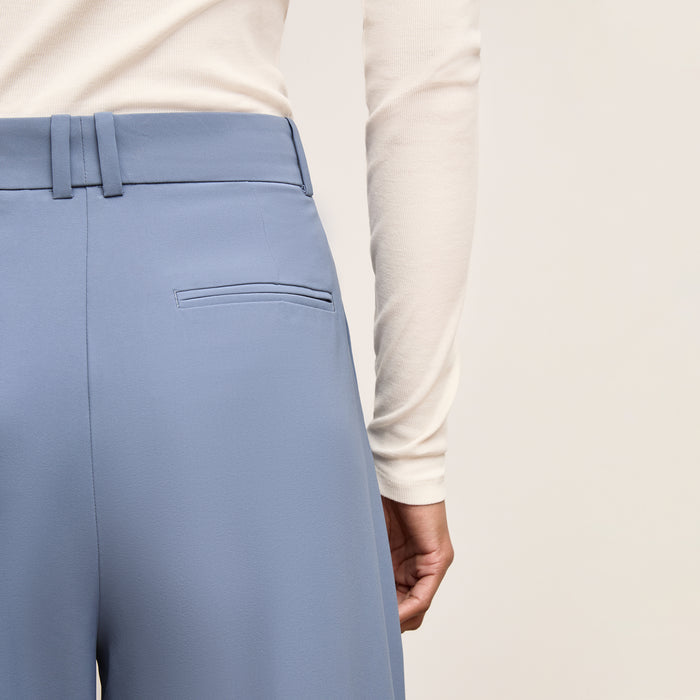 back image of a woman wearing Rina Sculptural Pant - OrigamiTech :: Dusty Blue