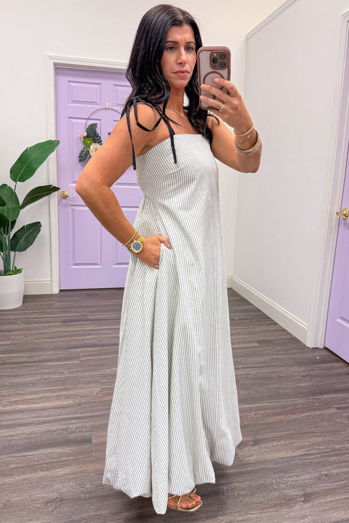 ivory and black striped sleeveless maxi dress with side pockets and bubble hem