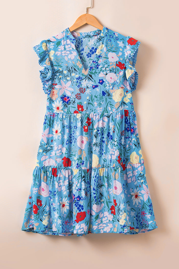 Robe à volants bleu ciel à manches flottantes et col en V