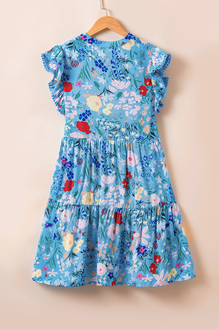 Robe à volants bleu ciel à manches flottantes et col en V