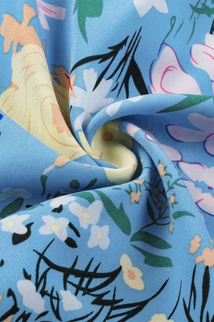 Robe à volants bleu ciel à manches flottantes et col en V