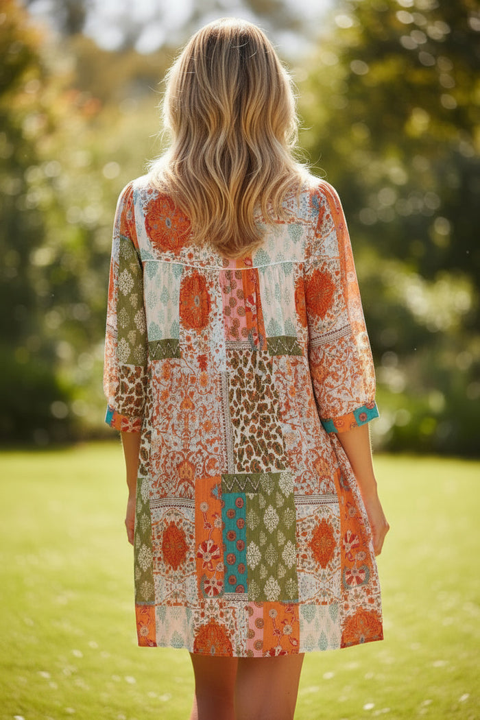 Robe ample en mousseline de soie à manches 3/4 *