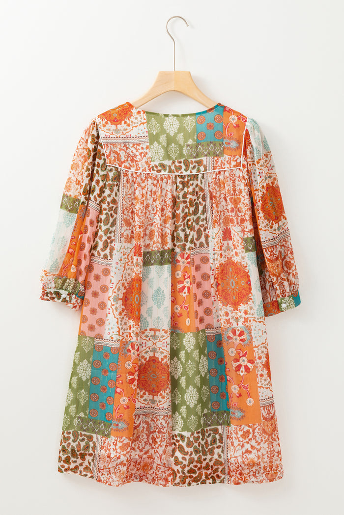 Robe ample en mousseline de soie à manches 3/4 *
