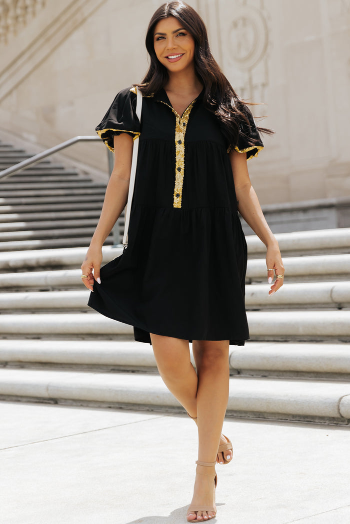 Robe chemise noire à manches bulles et bordure en sequins pour le jour du match