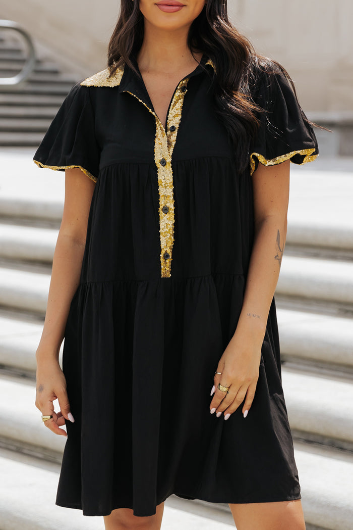 Robe chemise noire à manches bulles et bordure en sequins pour le jour du match