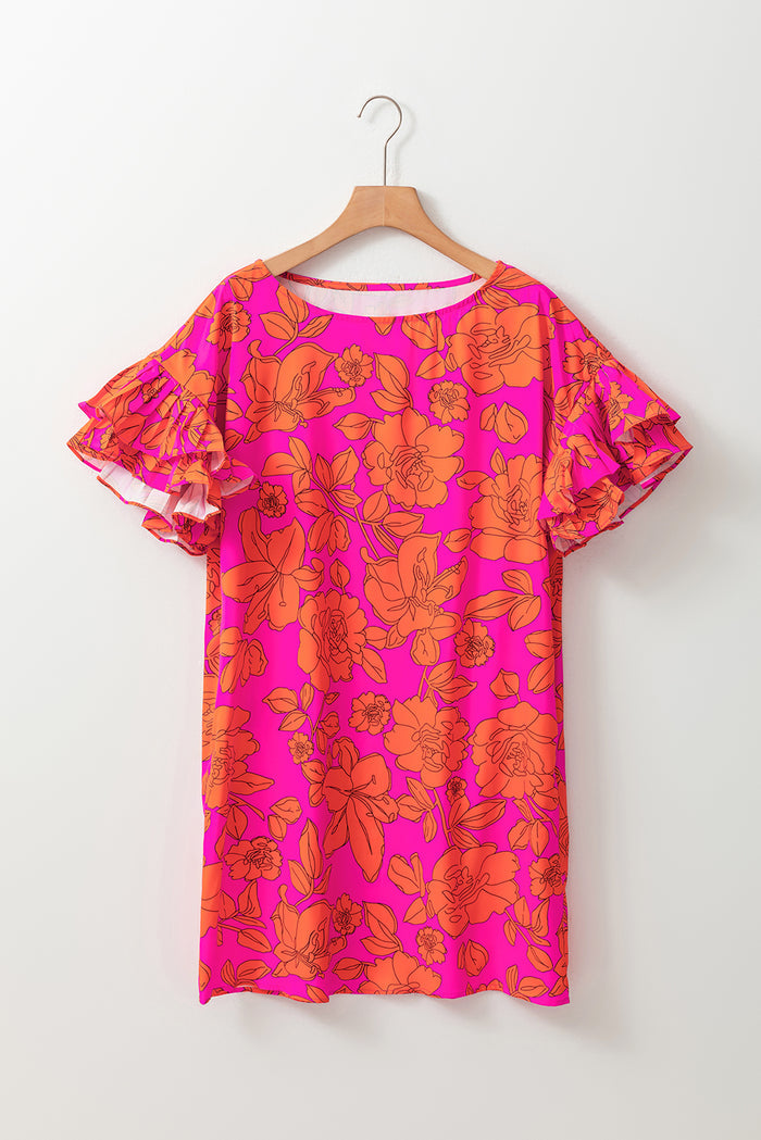 Robe fleurie rose volumineuse à manches volantées *