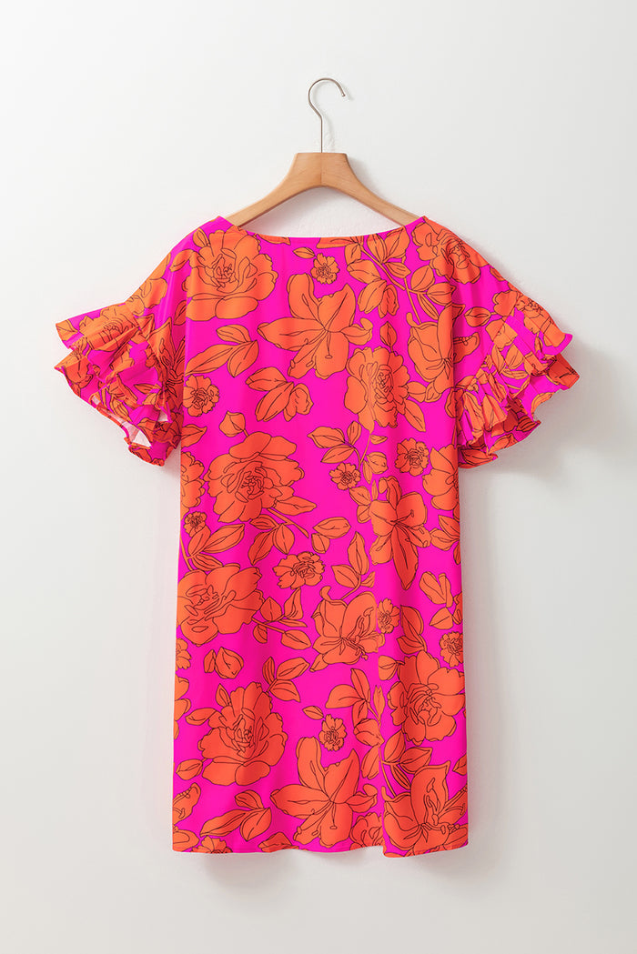 Robe fleurie rose volumineuse à manches volantées *