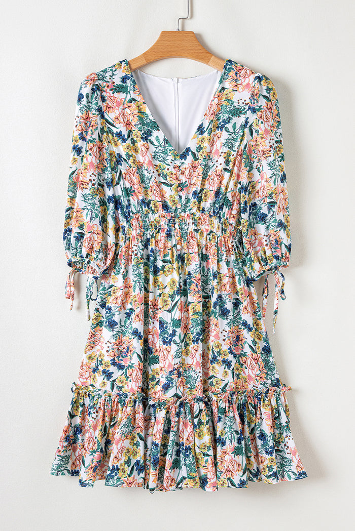 Robe florale bleu ciel à manches 3/4 *