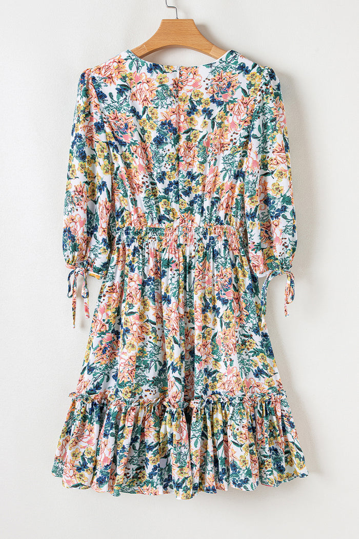 Robe florale bleu ciel à manches 3/4 *