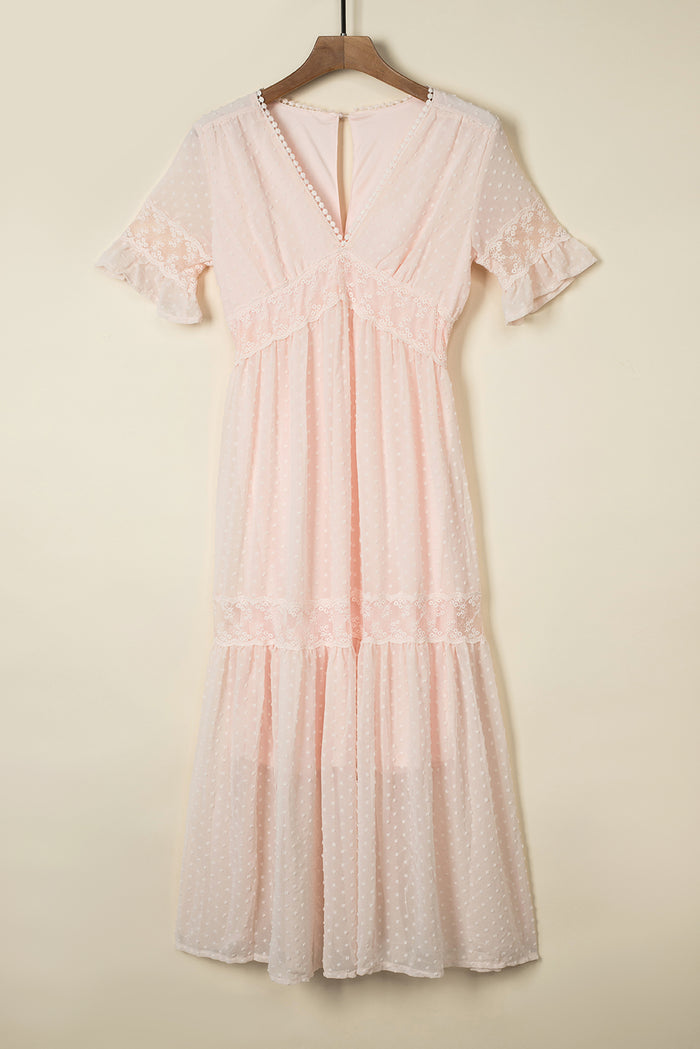 Robe longue en dentelle à pois suisses