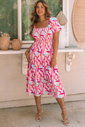 Robe rose smockée à volants et imprimé coup de pinceau