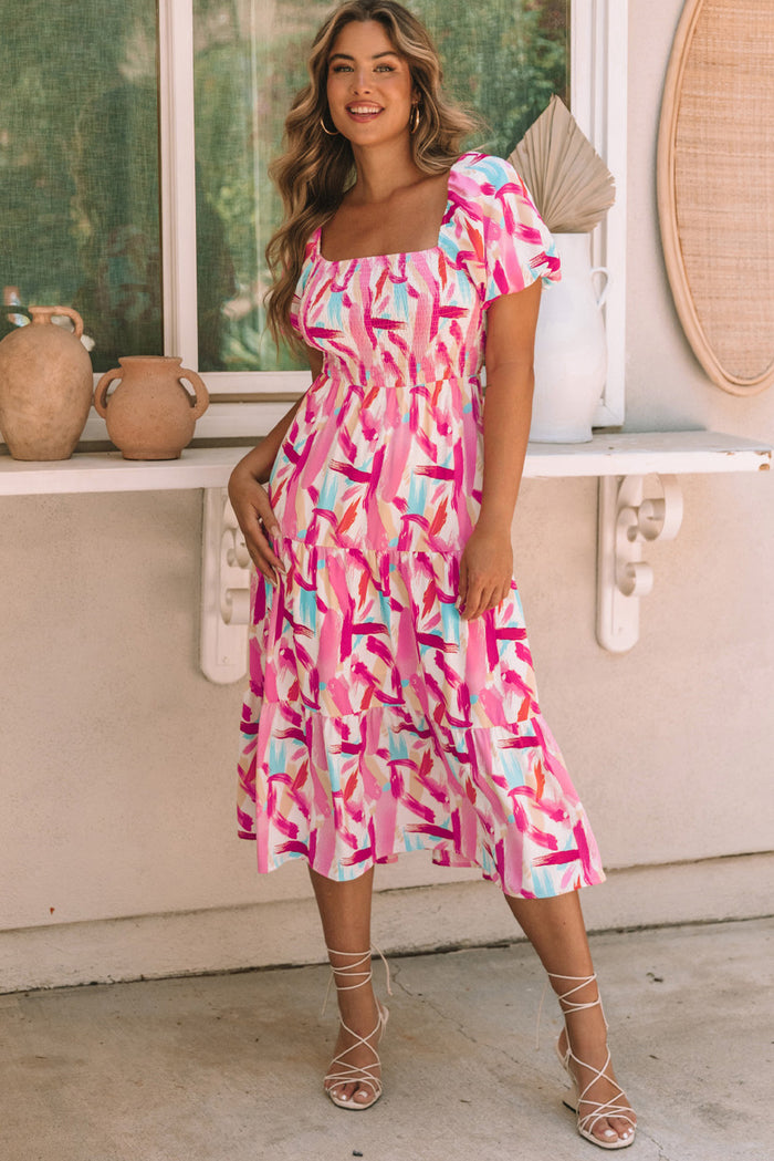 Robe rose smockée à volants et imprimé coup de pinceau