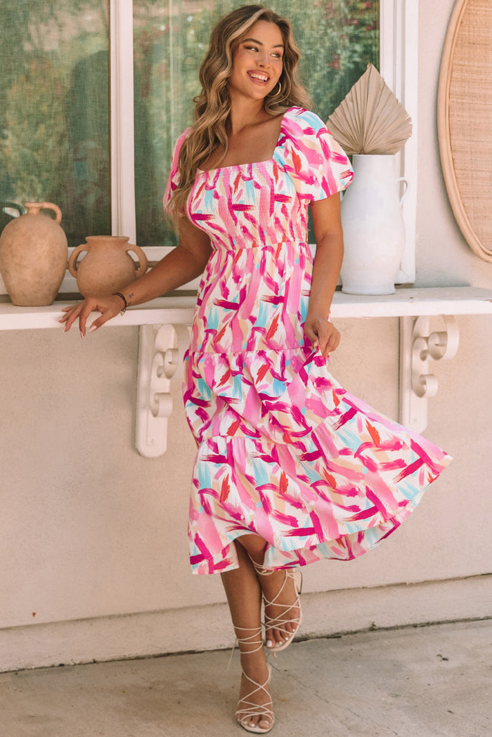 Robe rose smockée à volants et imprimé coup de pinceau