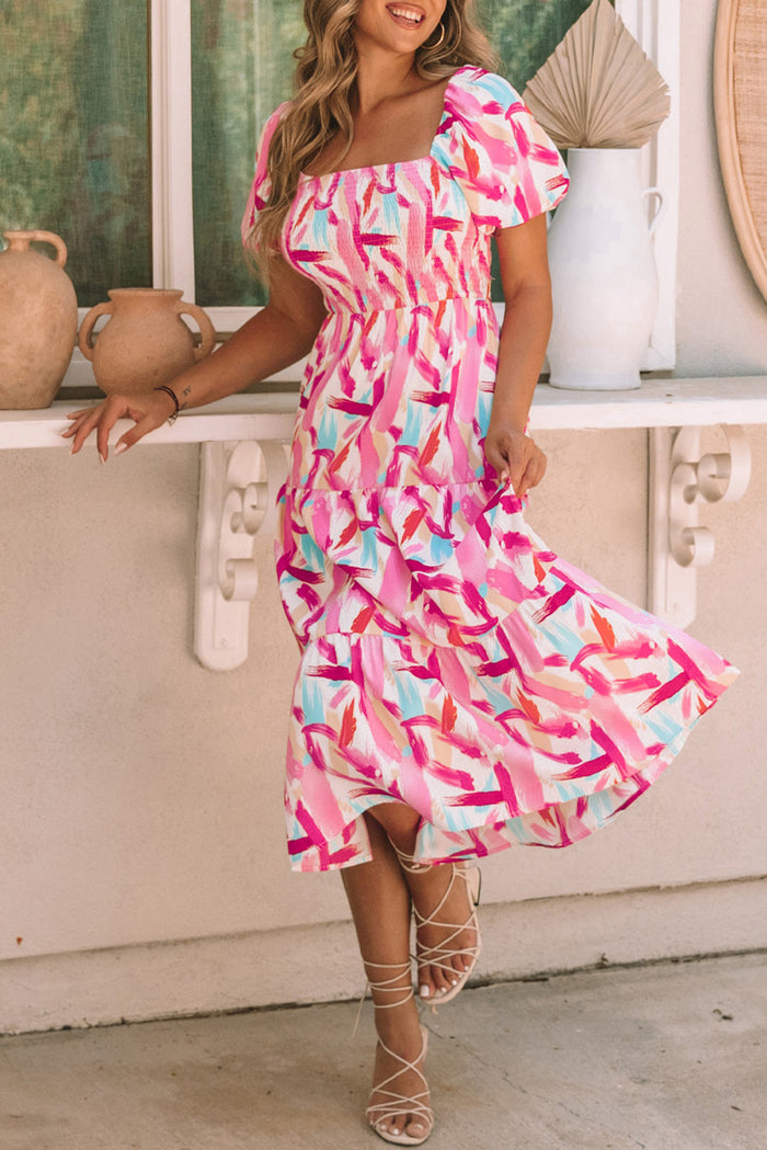 Robe rose smockée à volants et imprimé coup de pinceau
