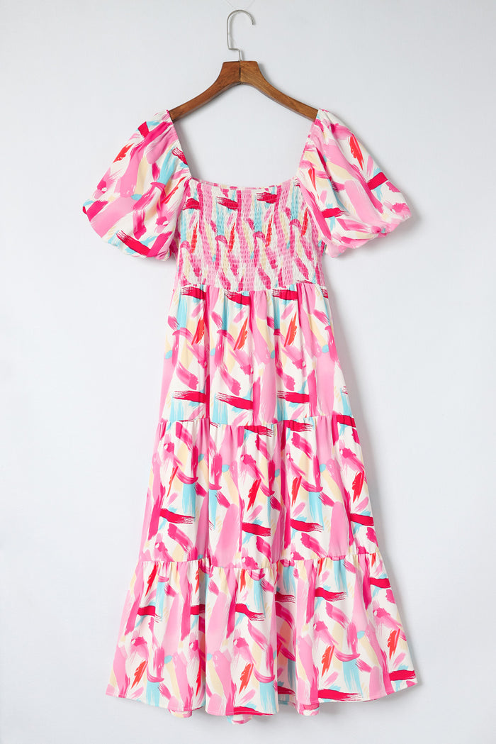 Robe rose smockée à volants et imprimé coup de pinceau