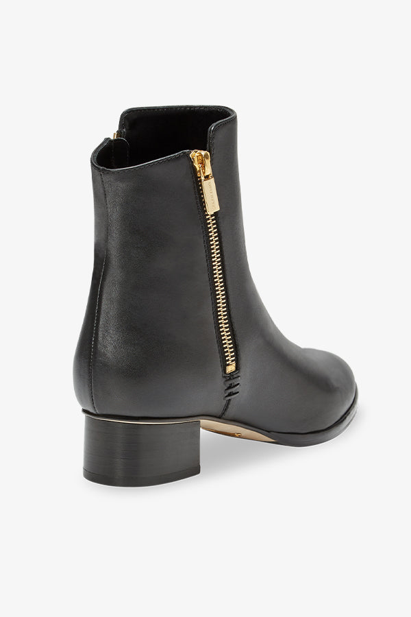 image of the zip bootie in black | Exclude  Grid Hover
