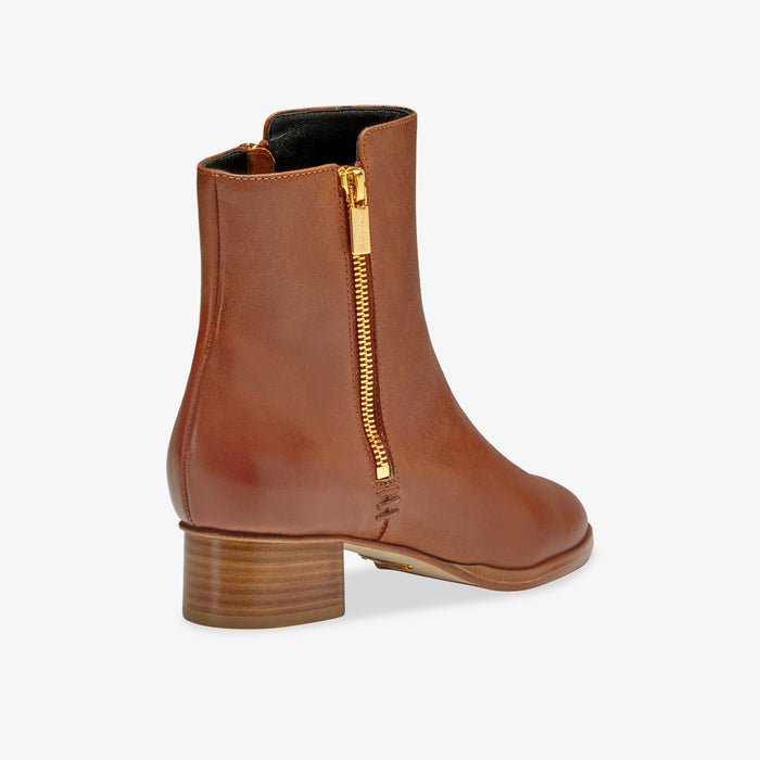 image of the perfect zip bootie in saddle vachetta