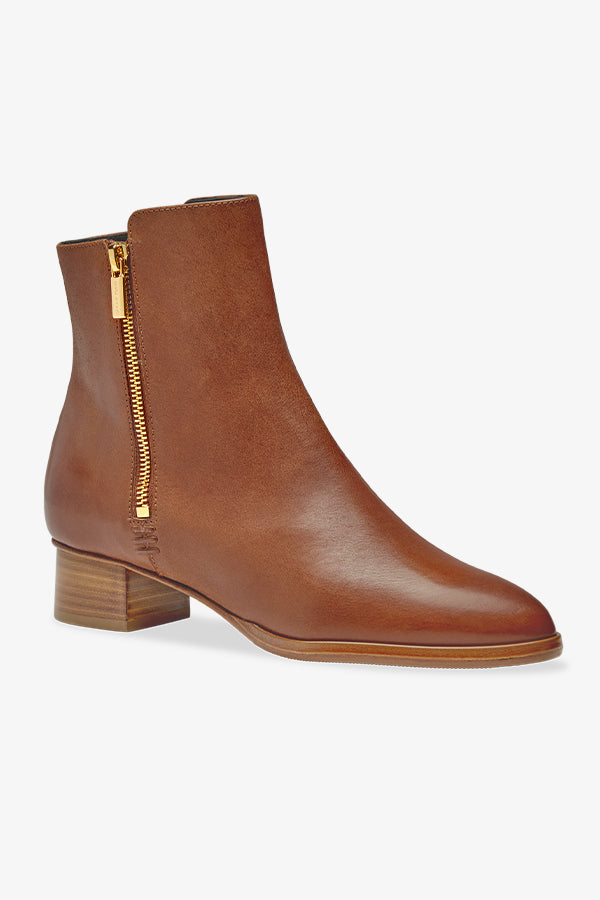 image of the perfect zip bootie in saddle vachetta | Exclude | Grid