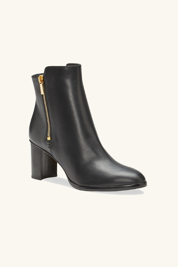 Black ankle boot with gold zipper on a white background | ALT GRID | Exclude