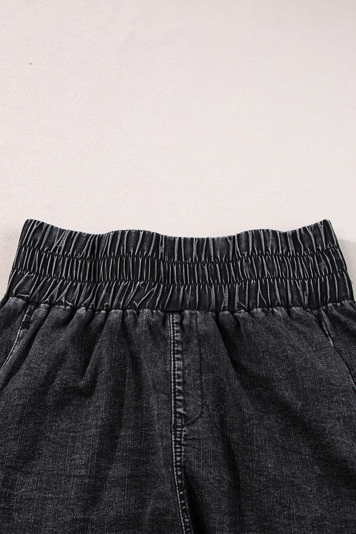 Short en jean noir smocké taille haute délavé minéral