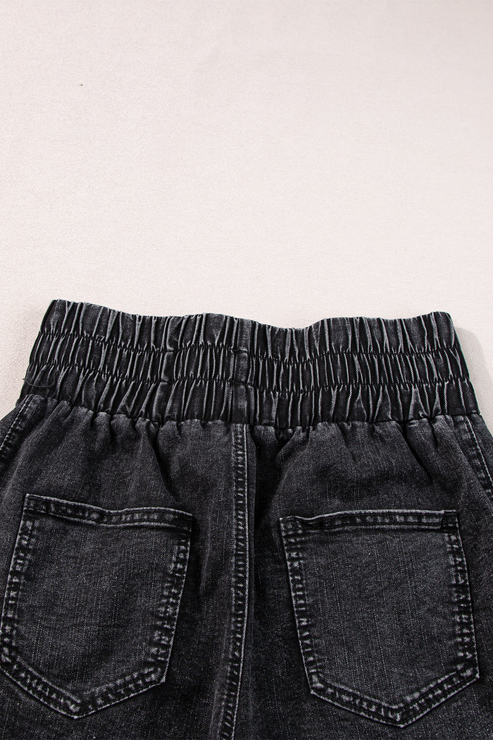 Short en jean noir smocké taille haute délavé minéral