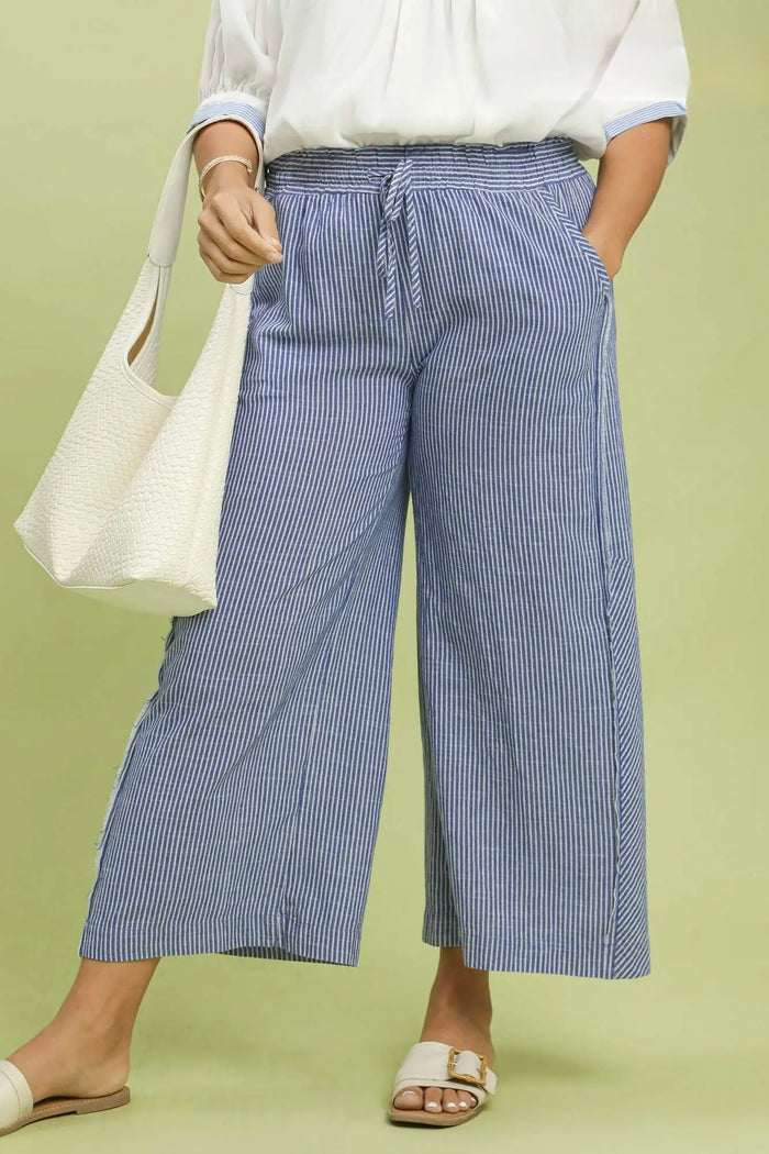 Umgee blue and cream striped wide leg linen pants with frayed seam details in plus size
