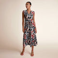 Woman wearing a floral dress | Lead