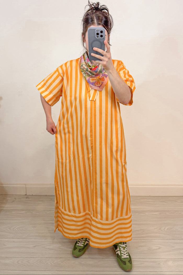 orange and pale peach alternating striped midi dress relaxed silhouette