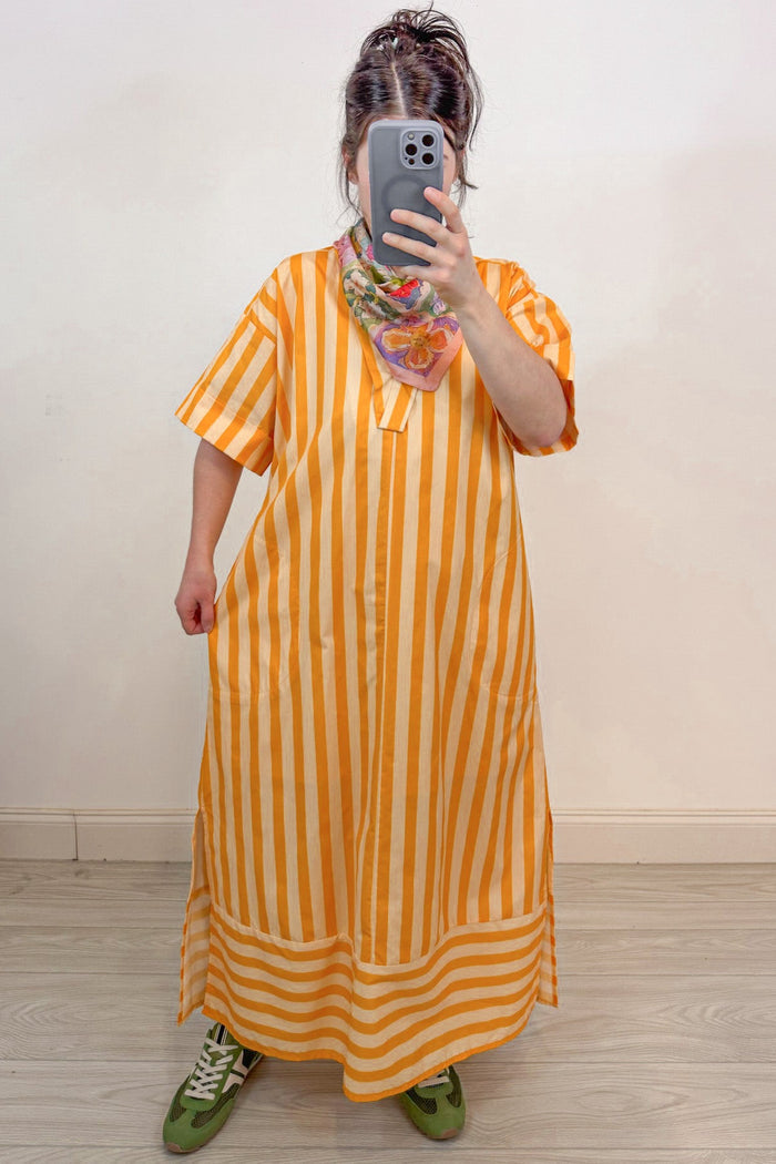 orange and pale peach striped short sleeve midi dress flowy silhouette