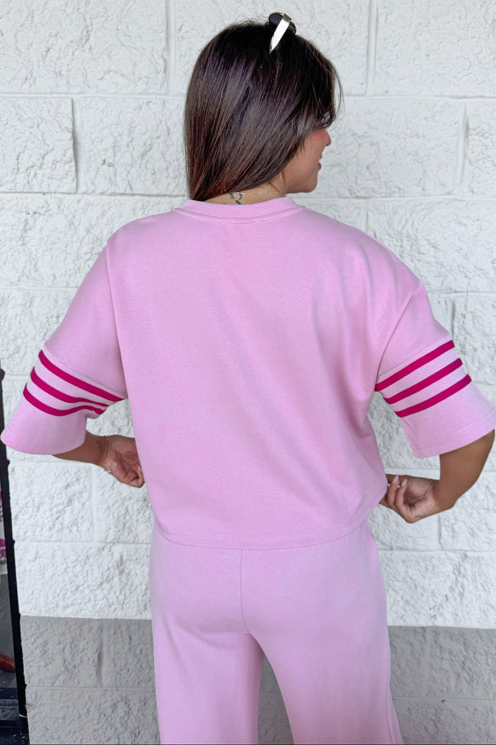 light pink with hot pink striped short sleeves crew neckline soft knit top