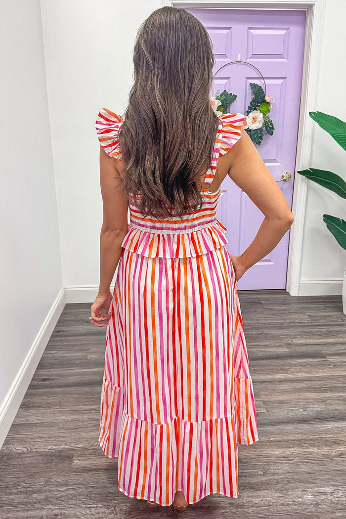 pink orange and white striped sleeveless smocked back midi dress