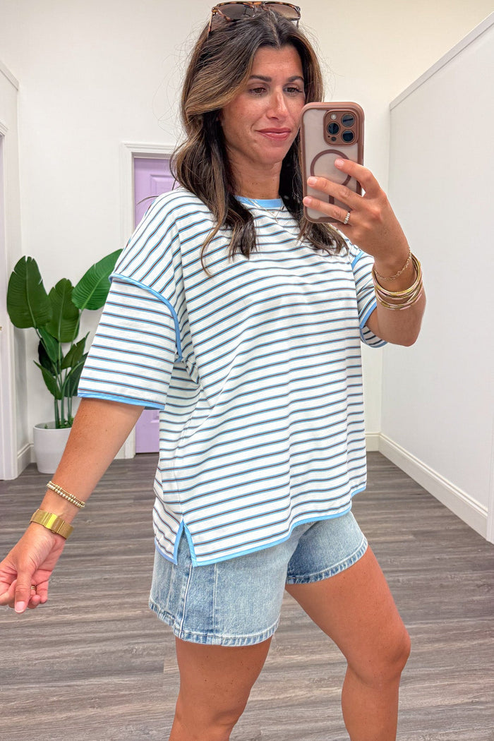 light blue cream and brown horizontal striped short sleeve crew neckline knit top