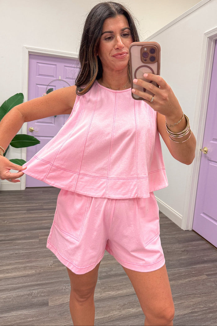 light pink with hot pink stitching sleeveless flowy silhouette semi-cropped knit top