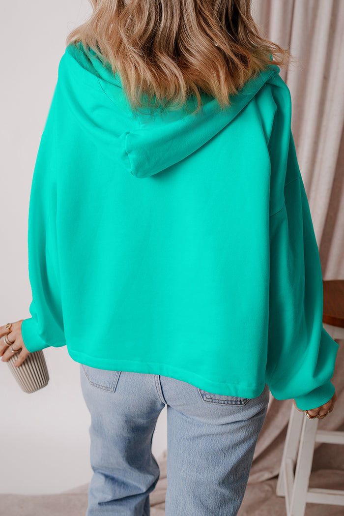 Sweat à capuche ample bleu Aruba doublé en polaire avec demi-fermeture éclair et poches kangourou