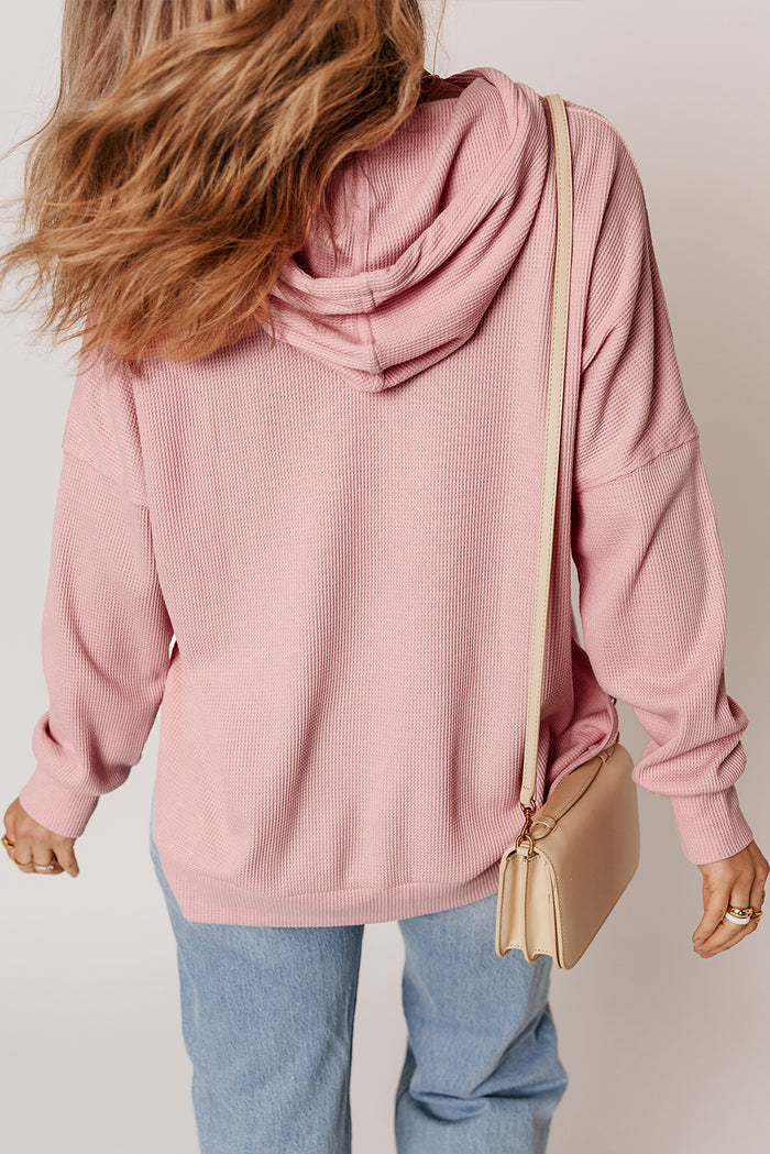 Sweat à capuche surdimensionné haut bas rose clair en tricot gaufré doublé de polaire