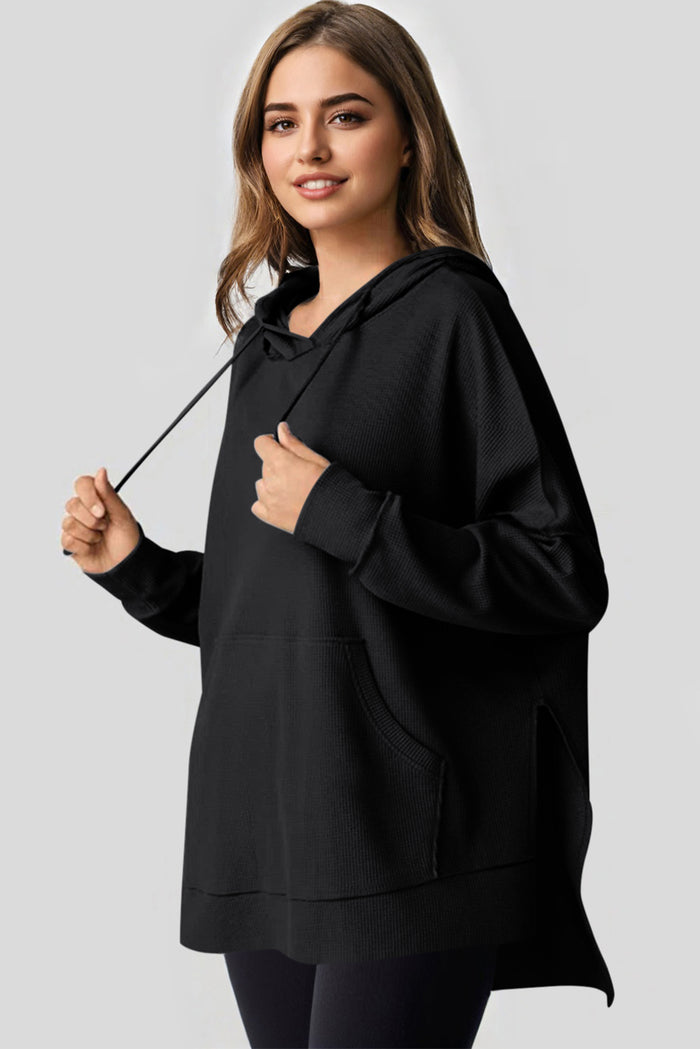 Sweat à capuche surdimensionné noir en tricot gaufré doublé de polaire