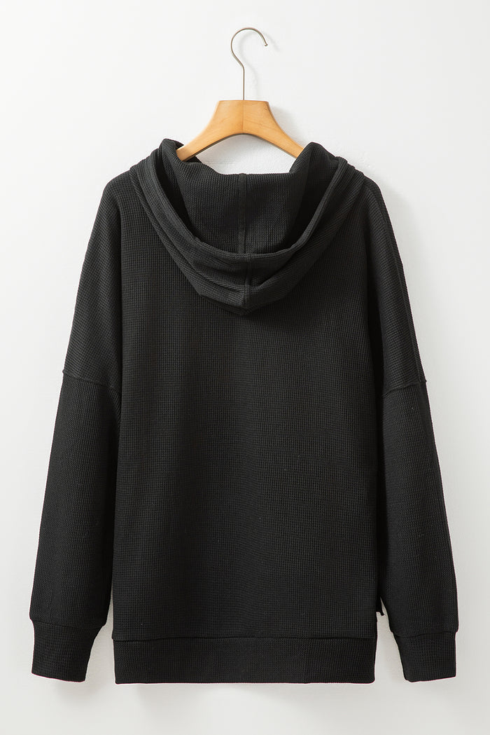 Sweat à capuche surdimensionné noir en tricot gaufré doublé de polaire